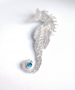 Silver seahorse opal brooch
