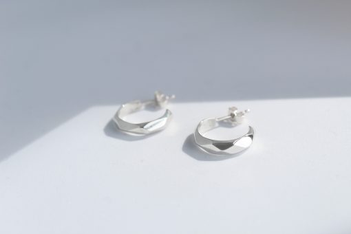Silver faceted mini hoop earrings